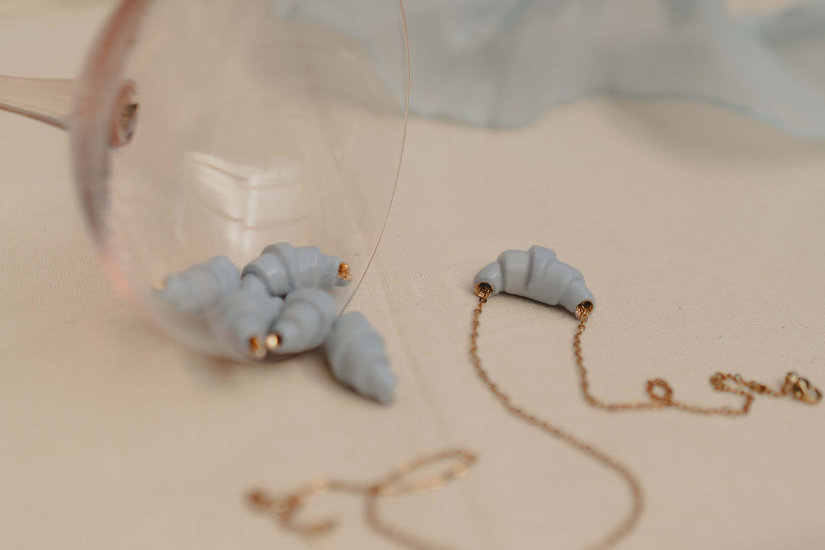 Croissant necklace blue