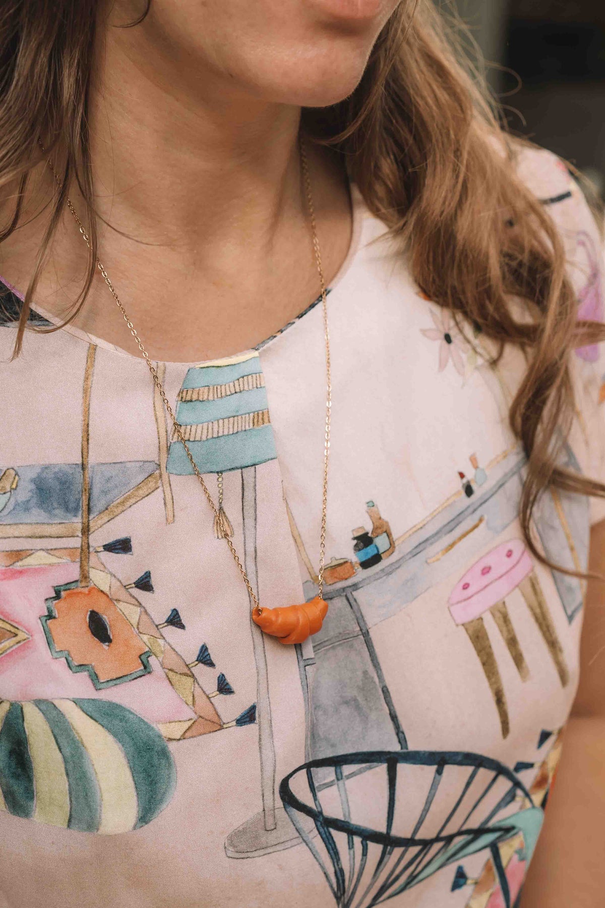 Croissant ketting orange