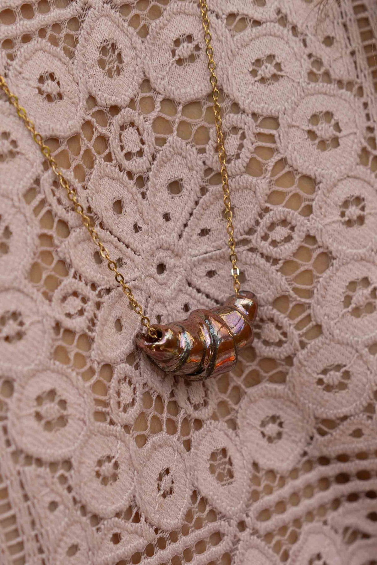 Croissant ketting oil